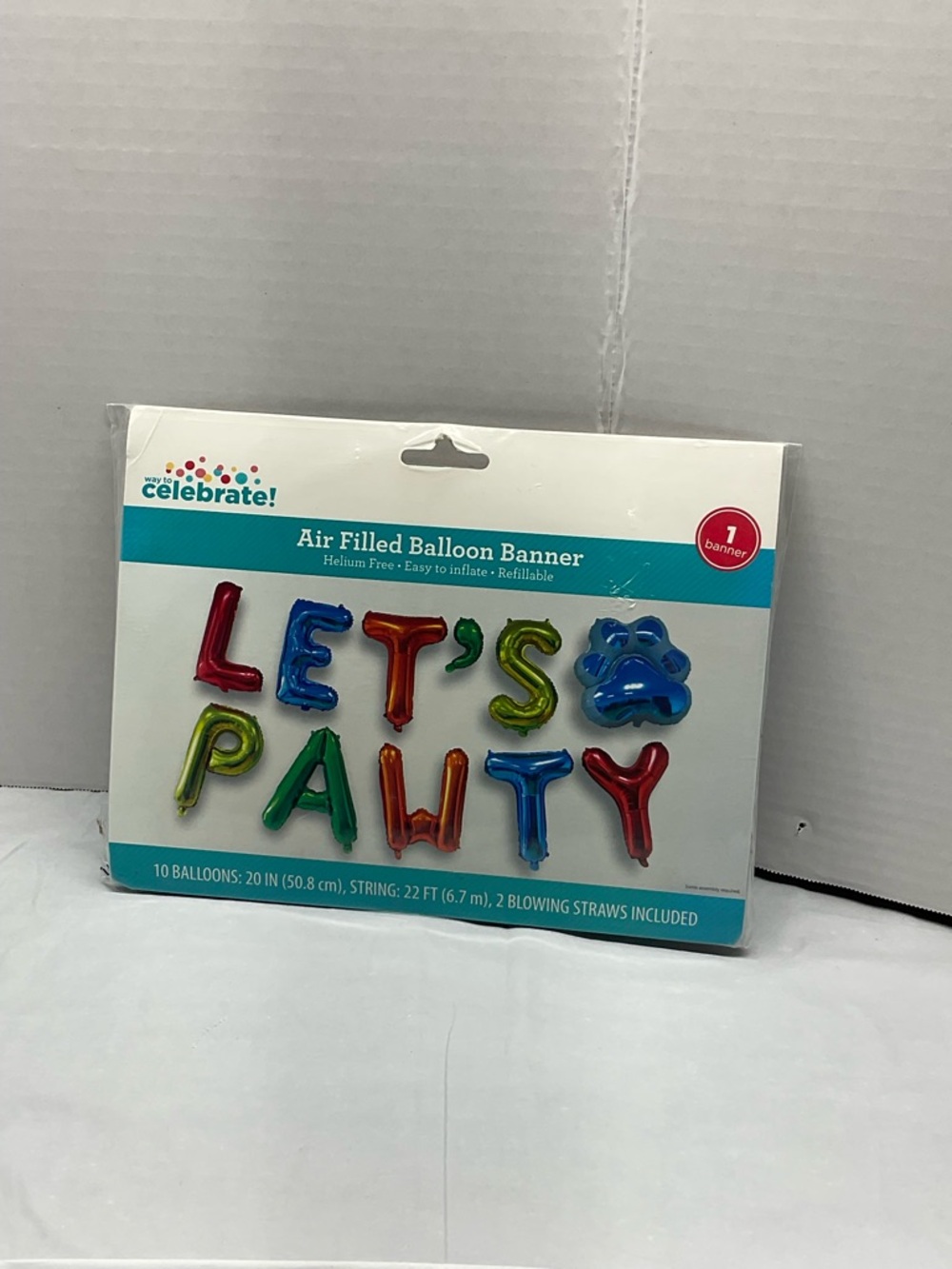 Celebrate! Multicolor "LET'S PAWTY" Air-Filled Balloon Banner